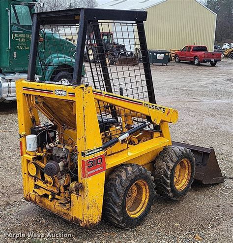 mustang 310 skid steer lift capacity|omc mustang 310 specs.